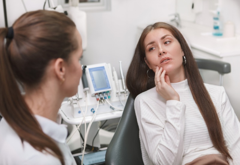 Patient receiving emergency dental treatment from a skilled dentist at OKC Dentistry in Oklahoma